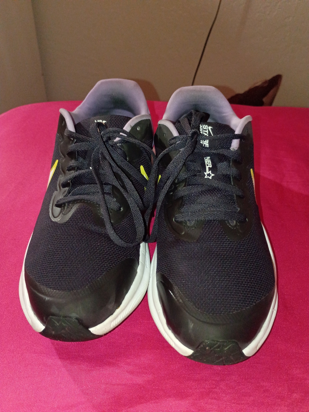 Nike Women's Dark Purple Athletic Sneakers with White Midsole and Yellow Swoosh